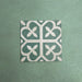 Iris Green Victorian Moroccan-style 20×20cm ceramic tile featuring a soft green and cream geometric pattern, ideal for adding decorative interest to floors and walls in both classic and contemporary interiors.