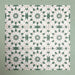 Group of Soukaina Green A Moroccan-style 20cm x 20cm patterned porcelain tiles, displaying a repeating geometric star motif in soft green, white and neutral tones with a matt finish.