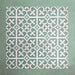 Group of Iris Green Victorian Moroccan-style 20×20cm porcelain tiles arranged together to showcase the repeating soft green and cream geometric pattern, ideal for creating decorative feature floors and walls.