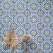 Fizaan Springs Mini Moroccan-style 15×15cm porcelain tiles laid in a repeating geometric pattern, featuring blue and green star motifs.