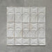 Group image of Beijing White Décor 10x10cm Moroccan square tiles arranged in a grid, featuring a raised crescent pattern and soft off-white glaze with subtle tonal variation for a handcrafted look.