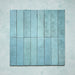 Madison Aquamarine Brick Wall Tiles 6x24.6cm — group layout showcasing the rich tonal variation and handcrafted charm of these glossy teal tiles. Their soft aquatic hues and subtle imperfections capture a timeless artisanal feel, perfect for adding depth and vibrancy to walls in kitchens, bathrooms, or feature spaces.