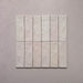 Zellij Pink Mist brick tile collection, 6.5cm x 20cm, rectangular Moroccan-style tiles arranged in a group, soft blush pink tones with subtle colour variation, glossy glazed finish, handcrafted look.
