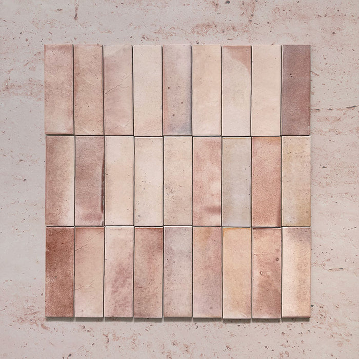Beijing Rose Pink Brick 5.1x16.1cm Moroccan-style ceramic wall tiles, styled in a grouped layout to showcase their soft blush tones and glossy handcrafted texture.