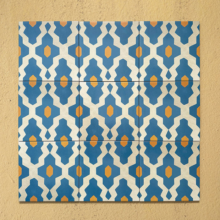 Cabana Zafini Mustard Azure 20x20cm Moroccan-style porcelain tiles shown in a grouped layout, featuring a repeating geometric lattice pattern in azure blue and mustard yellow on a cream background with a smooth matt finish.