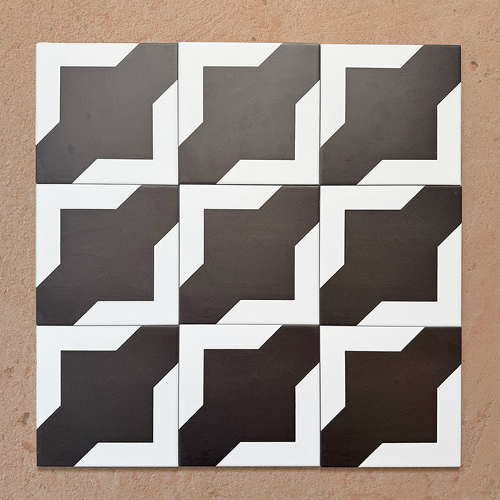 Alhambra Cathedral 20x20cm Moroccan tiles arranged in a group layout — featuring a bold black and white geometric cross design that creates a striking, modern pattern perfect for floors and feature walls.