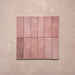 Zellij Rose Pink Brick tiles, 6.5cm x 20cm, brick format layout, soft rose pink and dusty blush tones with subtle tonal variation, smooth glazed finish, Moroccan-inspired design, group of tiles displayed.