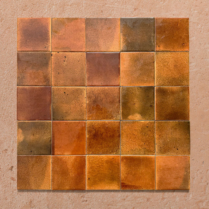 Beijing Amber Square 10x10cm Moroccan-style ceramic wall tiles, styled in a grouped layout to showcase their warm amber tones and glossy handcrafted texture.