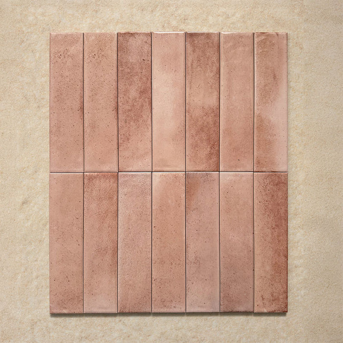 Izmir Brick Tusk Rose Gloss 6x25cm — group tile layout. Each tile displays rich variation in tone and texture, from soft blush pinks to deeper rose hues, creating a handcrafted look with a glossy, light-catching finish. Perfect for bringing warmth and Mediterranean charm to any interior space.