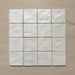 Zellij Oyster Square Moroccan-style tiles in a 10cm x 10cm format, arranged as a grouped layout to highlight the glossy off-white glaze and natural handmade surface variation on a neutral background.
