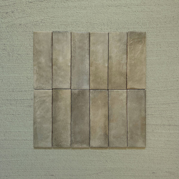 Zellij Weald Green Brick Moroccan Style 6.5cm x 20cm group of tiles, slim brick-format layout showing soft weald green and earthy taupe tones, natural tonal variation across tiles, lightly textured glazed finish, and handcrafted Moroccan-inspired design.