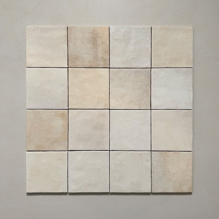 Zellij Bone Square Moroccan-style tiles in a 13.2cm x 13.2cm format, arranged as a grouped layout to showcase the warm beige tones and natural handmade surface variation on a neutral background.