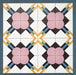 Group layout featuring Geometry Contour 20x20cm patterned tiles, showing a repeating design of pink four-petal motifs set within dark diamond shapes, intersected by mustard, teal, and navy linear accents on a crisp white background.