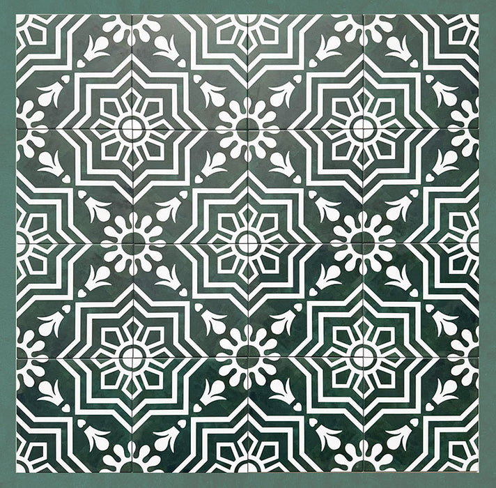 Group of Brompton Victorian Green 20x20cm geometric patterned ceramic tiles arranged together, showcasing a repeating white floral and star motif on a deep green background, displayed in a grid layout.