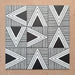 Alhambra Pyramid 20x20cm Moroccan tiles displayed in a bold geometric layout with alternating black and white triangle patterns and fine linear detailing for a striking modern look.