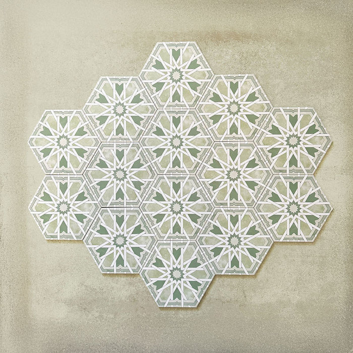 Maroush Mareshan Verde Green 18.7x21.6cm Moroccan hexagonal tiles arranged in a group layout, showcasing intricate white geometric star patterns on a soft green background inspired by traditional Moroccan design.