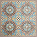 Group of Europa Hanover 20x20cm Victorian Moroccan style tiles arranged together to showcase the repeating decorative pattern in blue, terracotta, mustard and cream tones, displayed against a textured beige background.