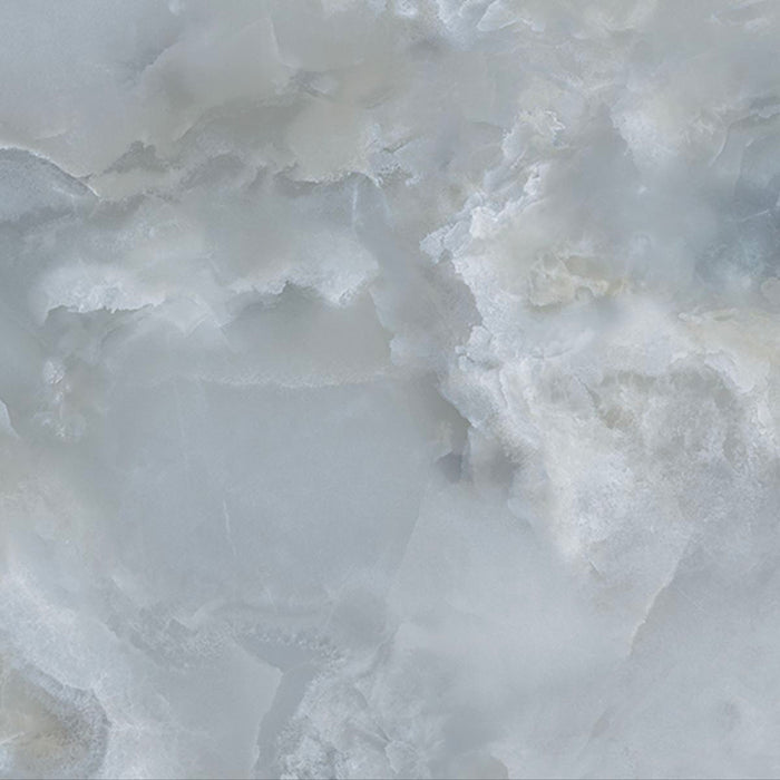 Close-up of Hashim Blue Honed Matt Onyx 60x60cm porcelain tile featuring soft blue onyx-effect veining with layered white, grey and pale blue tones. The honed matt finish creates a luxurious natural stone look, perfect for bathroom walls, feature walls and elegant interiors.