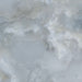 Close-up of Hashim Blue Honed Matt Onyx 60x60cm porcelain tile featuring soft blue onyx-effect veining with layered white, grey and pale blue tones. The honed matt finish creates a luxurious natural stone look, perfect for bathroom walls, feature walls and elegant interiors.