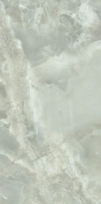 Close-up of Hashim Green Honed Matt Onyx 60x120cm porcelain tile featuring soft green onyx-effect veining with cloudy white and pale sage tones. The honed matt finish creates a natural stone look, ideal for bathroom walls, feature walls and luxurious interior spaces.