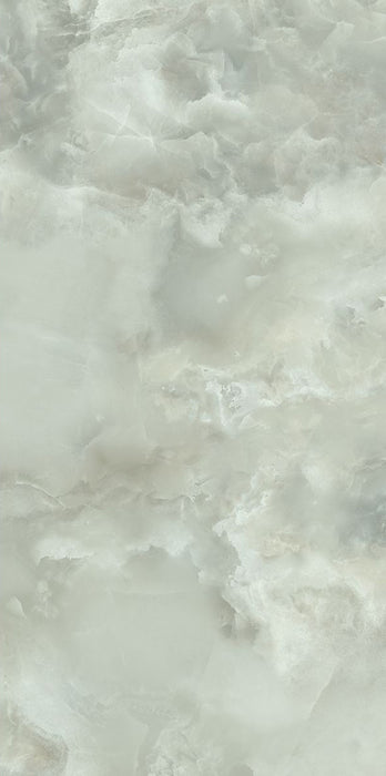 Close-up of Hashim Green Honed Matt Onyx 60x120cm porcelain tile featuring soft green onyx-effect veining with cloudy white and pale sage tones. The honed matt finish creates a natural stone look, ideal for bathroom walls, feature walls and luxurious interior spaces.