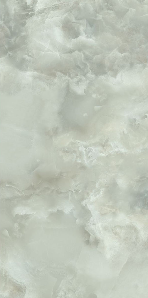 Close-up of Hashim Green Honed Matt Onyx 60x120cm porcelain tile featuring soft green onyx-effect veining with cloudy white and pale sage tones. The honed matt finish creates a natural stone look, ideal for bathroom walls, feature walls and luxurious interior spaces.