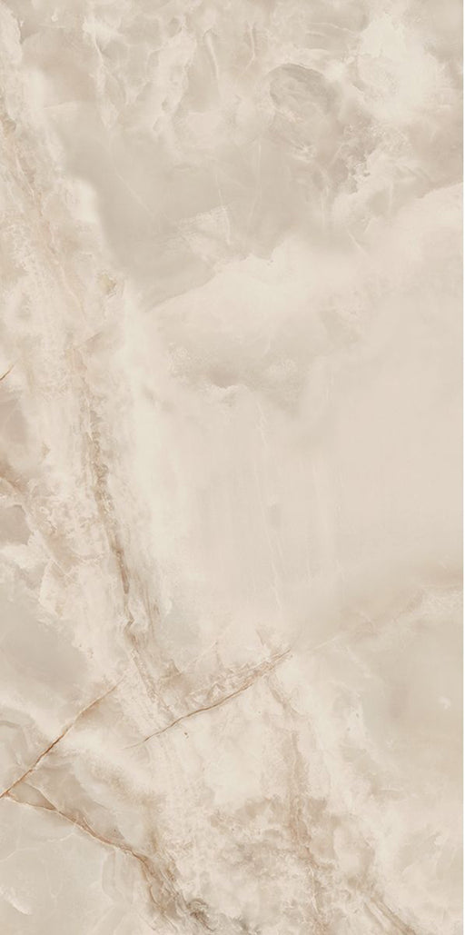 Close-up of Hashim Ivory Honed Matt Onyx 60x120cm porcelain tile featuring soft ivory onyx-effect veining with warm cream, beige and subtle golden tones. The honed matt finish creates a luxurious natural stone look, ideal for bathroom walls, feature walls and elegant interior spaces.