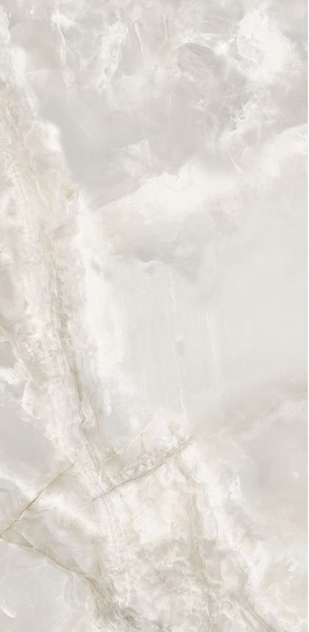 Close-up of Hashim White Honed Matt Onyx 60x120cm porcelain tile featuring soft white onyx-effect veining with delicate grey and warm beige tones. The honed matt finish creates a luxurious natural stone look, perfect for bathroom walls, feature walls and elegant interior spaces.