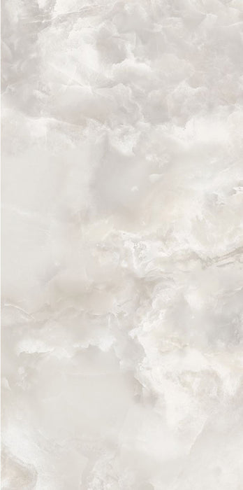 Close-up of Hashim White Honed Matt Onyx 60x120cm porcelain tile featuring soft white onyx-effect veining with delicate grey and warm beige tones. The honed matt finish creates a luxurious natural stone look, perfect for bathroom walls, feature walls and elegant interior spaces.