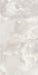 Close-up of Hashim White Honed Matt Onyx 60x120cm porcelain tile featuring soft white onyx-effect veining with delicate grey and warm beige tones. The honed matt finish creates a luxurious natural stone look, perfect for bathroom walls, feature walls and elegant interior spaces.