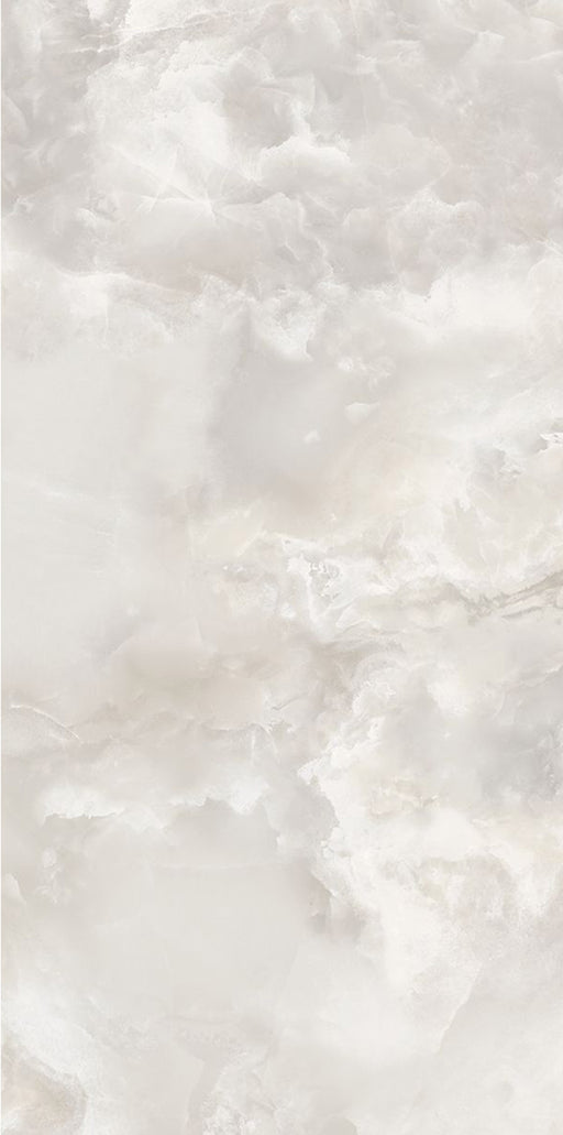 Close-up of Hashim White Honed Matt Onyx 60x120cm porcelain tile featuring soft white onyx-effect veining with delicate grey and warm beige tones. The honed matt finish creates a luxurious natural stone look, perfect for bathroom walls, feature walls and elegant interior spaces.