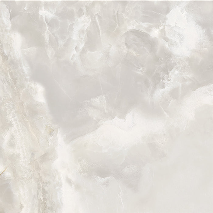 Close-up of Hashim White Honed Matt Onyx 60x60cm porcelain tile featuring soft white onyx-effect veining with delicate grey and warm beige tones. The honed matt finish creates a luxurious natural stone look, perfect for bathroom walls, feature walls and elegant interior spaces.