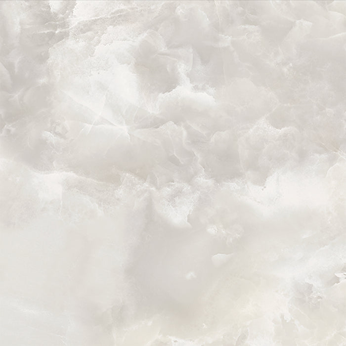 Close-up of Hashim White Honed Matt Onyx 60x60cm porcelain tile featuring soft white onyx-effect veining with delicate grey and warm beige tones. The honed matt finish creates a luxurious natural stone look, perfect for bathroom walls, feature walls and elegant interior spaces.