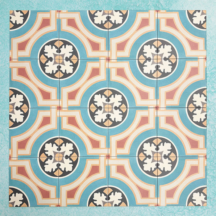 Group of Europa Helsinki 20x20cm Victorian Moroccan style tiles arranged together to showcase the repeating geometric pattern in teal, terracotta, cream and black tones, displayed against a textured aqua background.