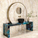 Luxury bathroom featuring Illuminati Precious Stone Ivory 60 × 120cm polished porcelain wall and floor tiles, showcasing soft ivory gemstone-inspired veining, paired with a statement mirror, black vessel basin, and bold blue stone-effect vanity unit.