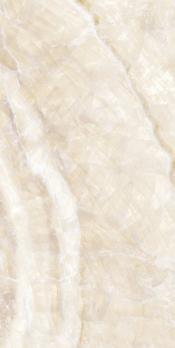 Close-up of Illuminati Precious Stone Ivory 60 × 120cm polished porcelain tiles, featuring soft ivory and cream gemstone-inspired tones with delicate veining, luminous detailing, and a refined high-gloss natural stone effect finish.