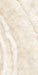Close-up of Illuminati Precious Stone Ivory 60 × 120cm polished porcelain tiles, featuring soft ivory and cream gemstone-inspired tones with delicate veining, luminous detailing, and a refined high-gloss natural stone effect finish.