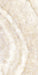 Close-up of Illuminati Precious Stone Ivory 60 × 120cm polished porcelain tiles, featuring soft ivory and cream gemstone-inspired tones with delicate veining, luminous detailing, and a refined high-gloss natural stone effect finish.