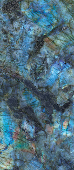 Close-up of Illuminati Precious Stone Labradorite 60 × 120cm polished porcelain tiles, featuring dramatic blue, charcoal, and iridescent gemstone-inspired veining with a high-gloss finish and striking natural stone effect detailing.