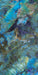 Close-up of Illuminati Precious Stone Labradorite 60 × 120cm polished porcelain tiles, featuring dramatic blue, charcoal, and iridescent gemstone-inspired veining with a high-gloss finish and striking natural stone effect detailing.