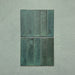 Izmir Green Gloss Pencil Bullnose Border Tile 1.2x30cm shown with matching Izmir Brick Green Gloss 6x25cm tiles, highlighting the glossy handcrafted effect finish and smooth rounded edge detail.