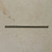 Izmir Sage Green Gloss Pencil Bullnose Border Tile 1.2x30cm displayed on a textured beige background, showing its slim rounded edge and glossy handcrafted effect finish.