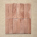 Izmir Brick Tusk Rose Gloss 6x25cm — group tile layout. Each tile displays rich variation in tone and texture, from soft blush pinks to deeper rose hues, creating a handcrafted look with a glossy, light-catching finish. Perfect for bringing warmth and Mediterranean charm to any interior space.