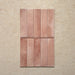 Izmir Tusk Rose Gloss Pencil Bullnose Border Tile 1.2x30cm — shown with matching Tusk Rose brick tiles. The soft pink tones and handcrafted gloss finish create a warm, artisan feel, while the pencil bullnose border adds a refined edge — ideal for framing splashbacks, feature walls, and alcoves with a polished finish.