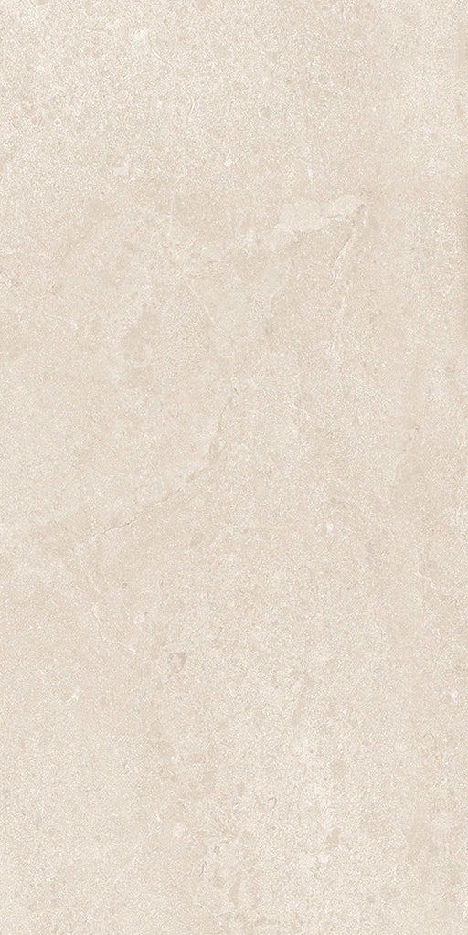 Close-up of Jeddah Avorio Neutra Stone 30x60cm stone-effect wall and floor tile, featuring warm ivory and beige tones with delicate natural stone-inspired veining and a subtle, elegant textured finish.