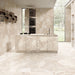 Contemporary kitchen featuring Jeddah Avorio Sassi Terrazzo Stone 60x120cm stone-effect wall and floor tiles, showcasing warm ivory and beige tones with natural stone-inspired detailing, paired with a matching waterfall island, integrated cabinetry and floor-to-ceiling glazing.
