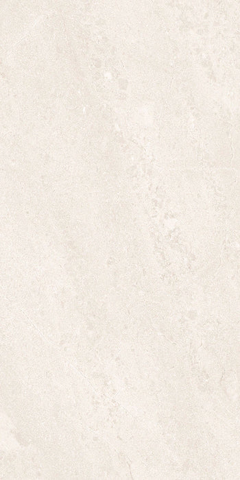 Close-up of Jeddah Blanco Neutra Stone 30x60cm stone-effect wall and floor tile, featuring soft cream and ivory tones with delicate natural stone-inspired veining and a subtle, elegant textured finish.