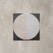 Kasuf Night 20x20cm terrazzo-style decor tiles featuring a bold monochrome circular pattern with speckled terrazzo detailing, ideal for creating statement floors and contemporary geometric interiors.