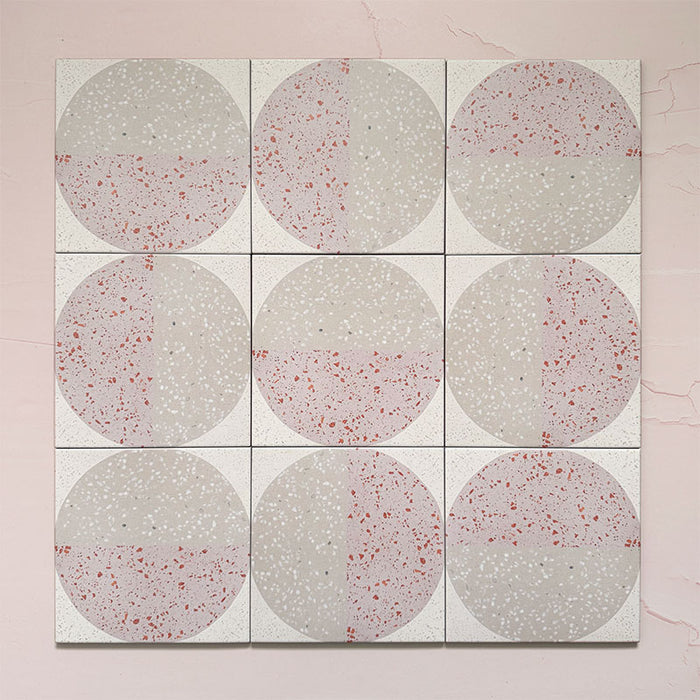 Kasuf Rose 20x20cm terrazzo-style decor tiles featuring a soft pink and neutral circular pattern with speckled terrazzo detailing, ideal for adding a playful yet elegant geometric look to contemporary interiors.