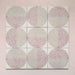 Kasuf Rose 20x20cm terrazzo-style decor tiles featuring a soft pink and neutral circular pattern with speckled terrazzo detailing, ideal for adding a playful yet elegant geometric look to contemporary interiors.
